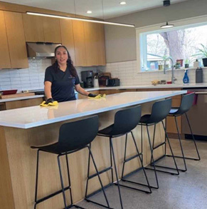 Photo of our team cleaning a kitchen